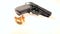 Semi-automatic handgun with golden teargas cartridges, beauty-shot