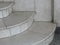 Semi-circular staircase made of marble