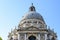 Semi-detailed dome of the Basilica di Santa Maria della Salute (iconic 17th century church). Venezia, Italy