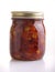 Semi-dried tomatos in glass jar