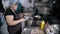 semi-finished meat products. cooking. the chef lays out semi-finished meat products, frozen meatballs in boiling water