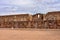 Semi-subterranean temple with the Ponce monolith visible in the Kalisasaya gateway. Tiwanaku archaeological site, La Paz, Bolivia