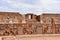 Semi-subterranean temple with the Ponce monolith visible in the Kalisasaya gateway. Tiwanaku archaeological site, La Paz, Bolivia