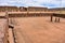 Semi-subterranean temple with the Ponce monolith visible in the Kalisasaya gateway. Tiwanaku archaeological site, La Paz, Bolivia