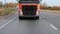 Semi-trailer driving on a multilane highway. Close-up of the front of the truck