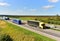 Semi-trailer truck DAF driving along highway. Truck convoy or caravan of trucks delivery goods by roads. Services and Transport