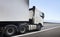 Semi Trailer Truck Driving on the Road. Cargo Shipping Container Trucks. Delivery. Diesel Tractor Lorry. Freight Truck Logistics