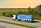 Semi-trailer truck by Sovtransavto Trucking Company driving along on the highway. MOSCOW REGION - SEPT 16, 2020