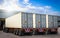 Semi Trailer Trucks on The Parking Lot at Warehouse. Loading Dock Warehouse. Freight Trucks Cargo Transport, Warehouse Logistics.