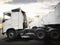 Semi TrailerTrucks Parked with The Sunset Sky. Shipping Container Trucks. Engine Diesel Trucks. Lorry Tractor. Freight Trucks.