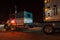 Semi truck attached to a animal carrier trailer/ Parked truck an