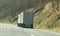 Semi Truck Driving Through The Mountains