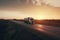 Semi Truck Driving on The Road at Sunset Sky. Industry Road Freight Trucks. Lorry Tractor