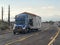 Semi Truck Hauling an Oversize Mobile Home to Destination! Transportation and Logistics!