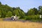 Semi Truck with tanks on scenic winding highway road