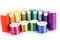 Semicircle of many-coloured bobbins of thread