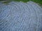 A semicircular staircase made of pavers, stylized as a Roman amphitheater. Playground in the park made of processed stones