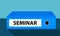 Seminar, blue ring binder or folder