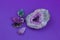 Semiprecious stones - amethyst, smoky quartz, fluorite, on a purple background