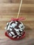Semisweet chocolate covered apples and a ribbon