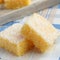 Semolina cake with coconut on a blue background
