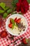 Semolina with grated chocolate and strawberry on a fabulously delicious tomorrow. Wooden background. Top view. Close-up