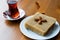 Semolina Halva with Almonds cut in square.