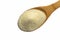 Semolina in a wooden spoon on a white background