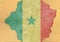 Senegal cracked hole and broken flag in big concrete material facade