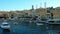 SENGLEA, MALTA - JUNE 18, 2018: The yacht trip along the coast of L-Isla with historic edifices, cozy cafes, luxury restaurants an