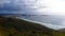 Senic View from Cape Reinga at beach and ocean waves in New Zealand