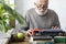 Senior Adult Typing Typewriter concept