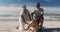 Senior african american couple petting a dog at the beach