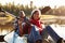 Senior African American Couple Rowing Kayak On Lake