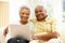 Senior African American couple using laptop