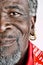 Senior African American man with earrings