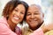 Senior African American man and granddaughter