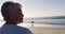 Senior african american woman walking at the beach