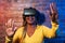 Senior African woman having fun with futuristic virtual reality goggles