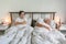 Senior aging married couple man male and female woman sleep together in bed sexual problems dysfunction mad angry