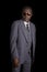 Senior black african american man in grey suit