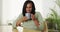 Senior black woman drinking hot coffee