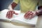 Senior blind man reading a braille book