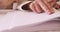 Senior blind man reading a braille book