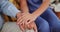 Senior care, empathy or closeup of nurse holding hands with person for healthcare, wellness or service. Support, love