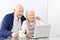 Senior citizen couple using