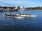 Senior Citizens Paddling Long Canoes