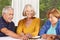 Senior citizens playing domino game