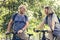 Senior couple biking at the park