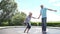 Senior Couple Bouncing On Trampoline In Slow Motion